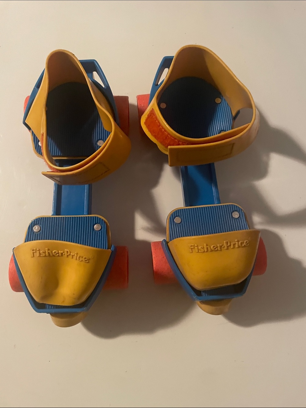 Fisher-Price Yellow and Blue Adjustable Kids Roller Skates with Orange Wheels